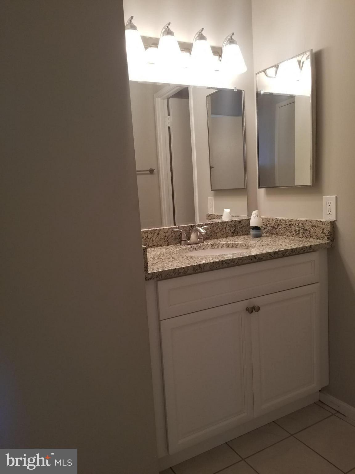 5911 Edsall Road, Unit PH09 Alexandria, VA 22304 - Photo 9 of 14 a utility room with washer and dryer