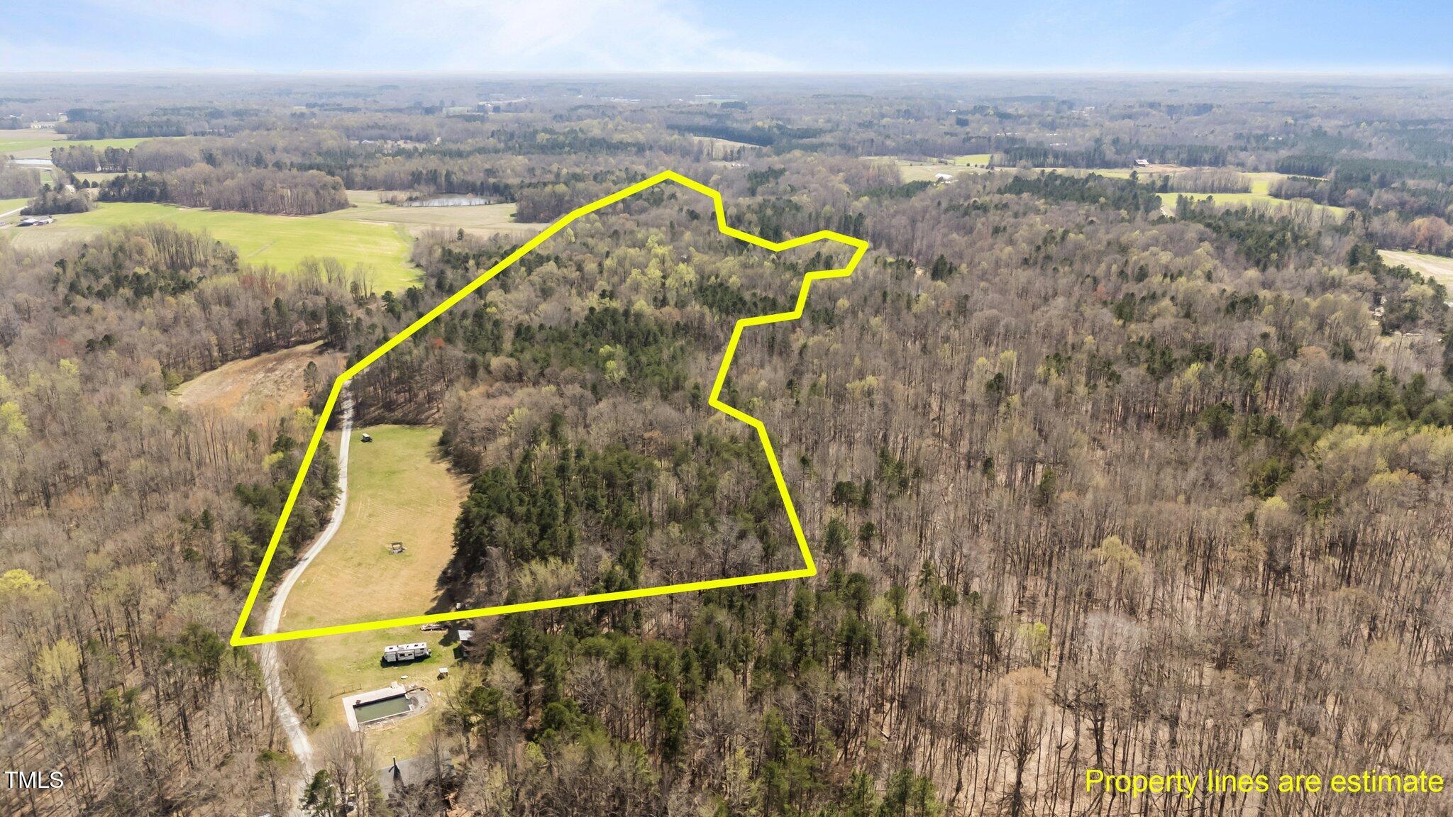8729-lot B Allison Road Cedar Grove, NC 27231 - Photo 6 of 23 a view of a swimming pool with a lake view and mountain view