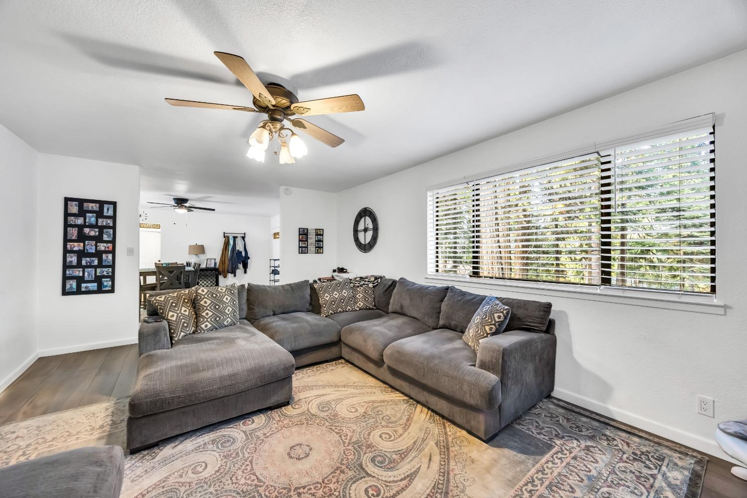 6922 Ridgeway Drive Pollock Pines, CA 95726 - Photo 12 of 44 a living room with furniture and a window