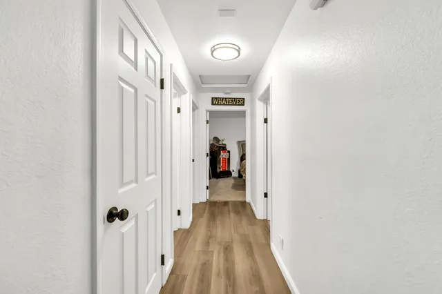 a bedroom with a bed and a tv on table