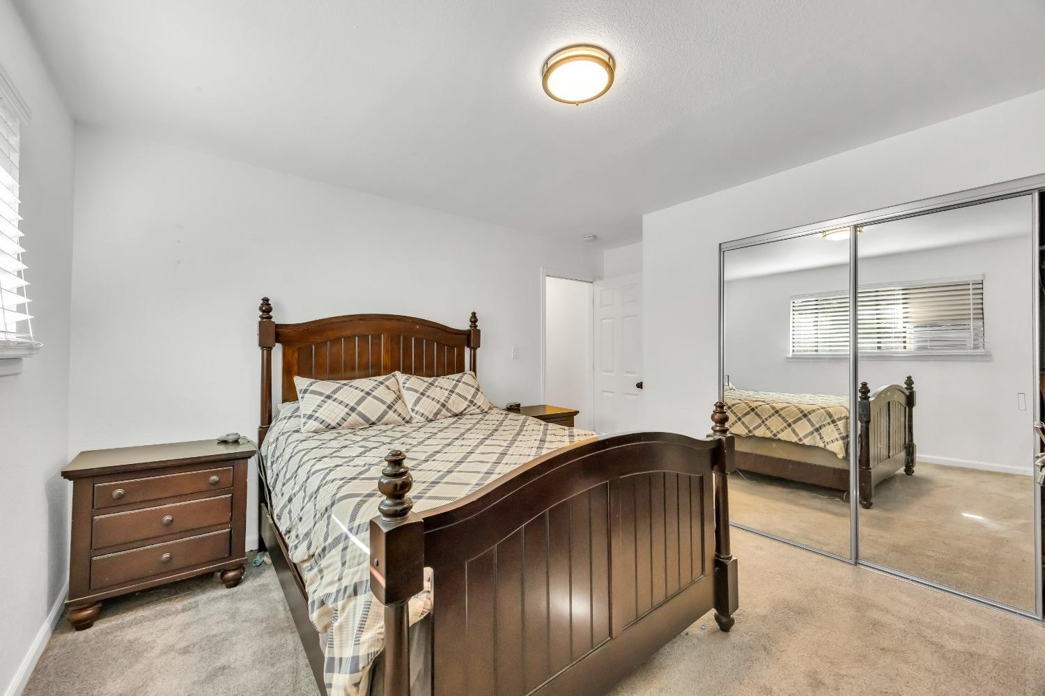 6922 Ridgeway Drive Pollock Pines, CA 95726 - Photo 29 of 44 a bedroom with a bed and a window