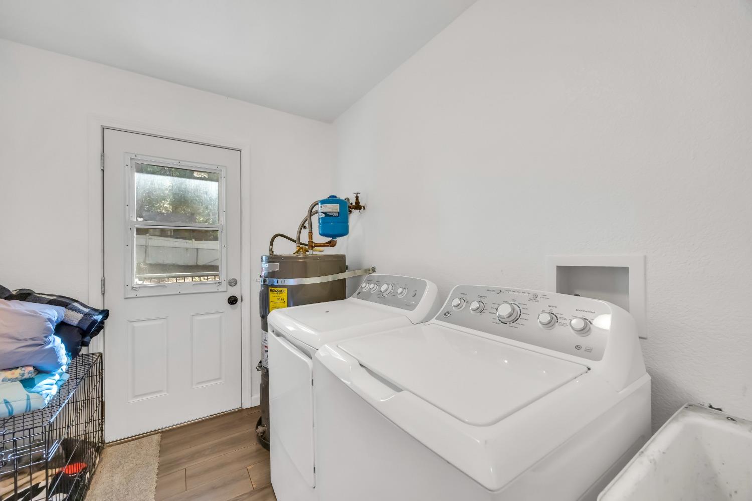 6922 Ridgeway Drive Pollock Pines, CA 95726 - Photo 31 of 44 a utility room with dryer and washer