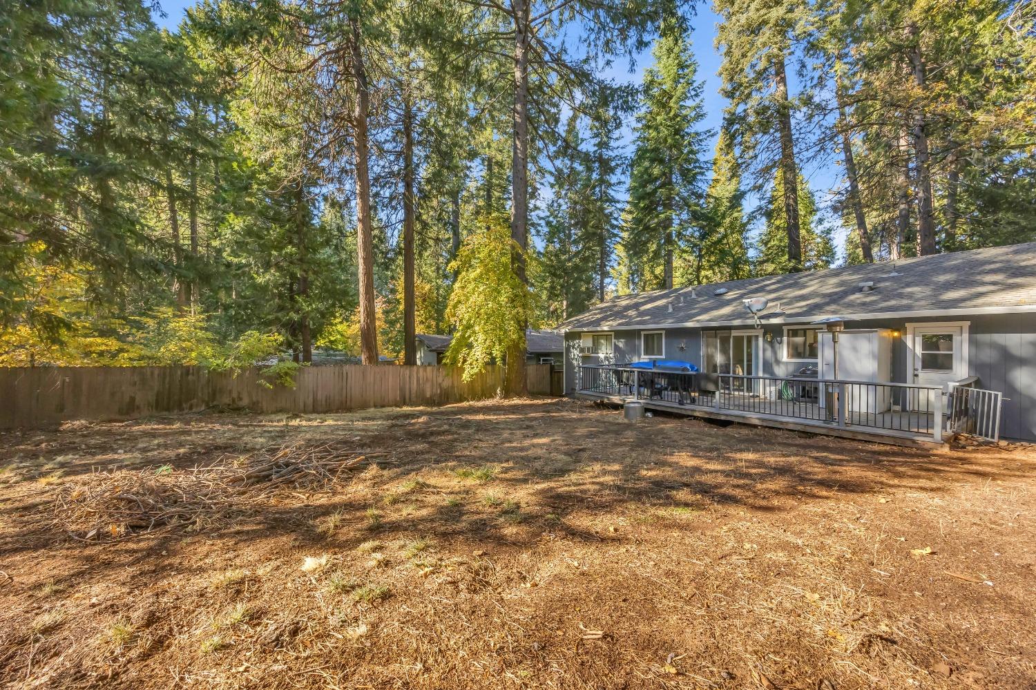 6922 Ridgeway Drive Pollock Pines, CA 95726 - Photo 35 of 44 a view of a house with a yard
