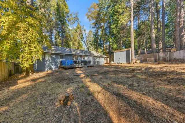 a backyard of a house with lots of green space