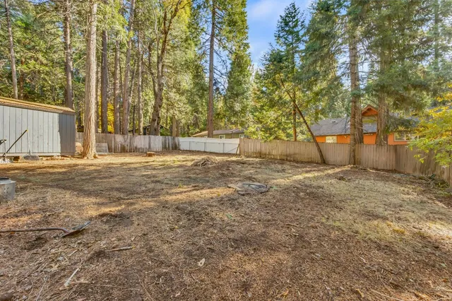 a view of a chair and table in the patio