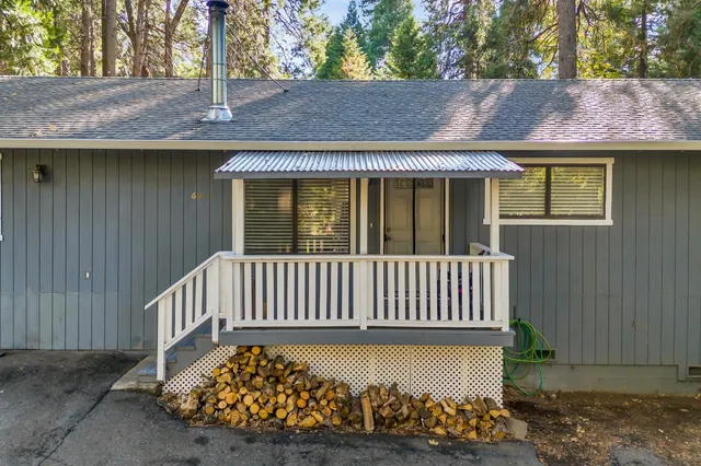 a view of mountain with an ocean