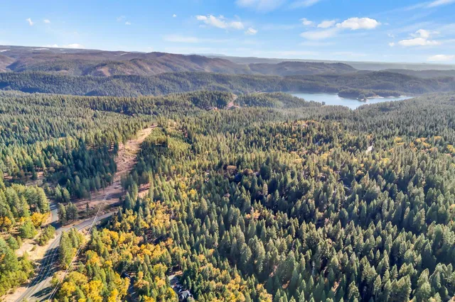 a view of house with outdoor seating space