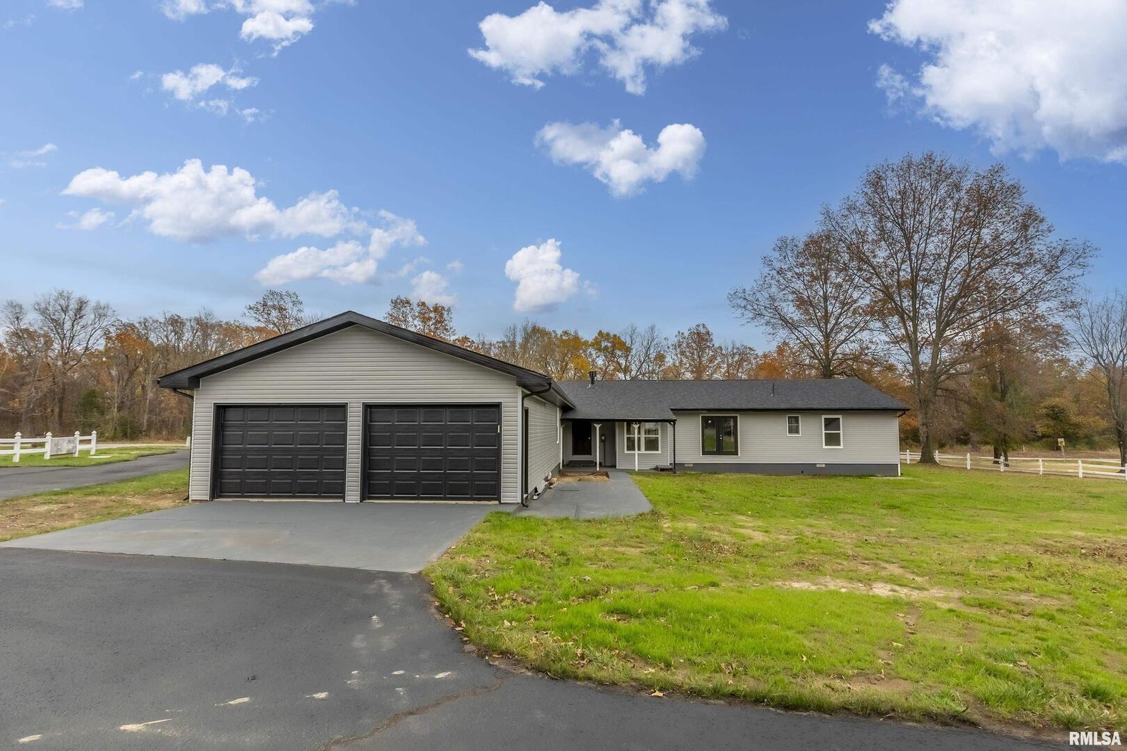7837 Highway 37 Benton, IL 62812 - Photo 11 of 37 a view of a house with a swimming pool and a yard