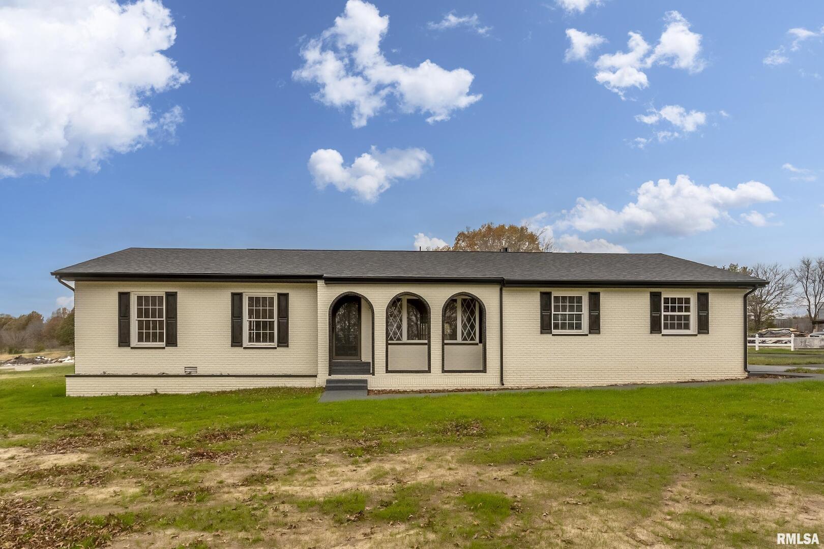 7837 Highway 37 Benton, IL 62812 - Photo 13 of 37 a view of a house with a backyard