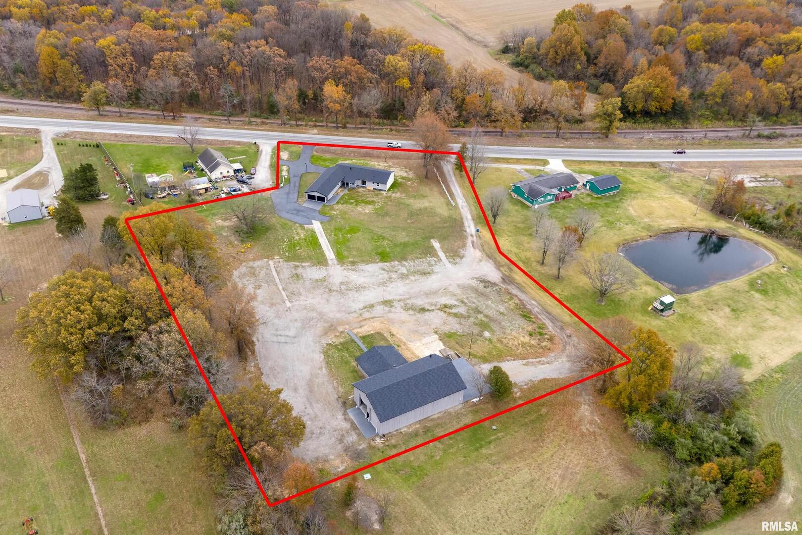 7837 Highway 37 Benton, IL 62812 - Photo 3 of 37 an aerial view of a swimming pool with a yard