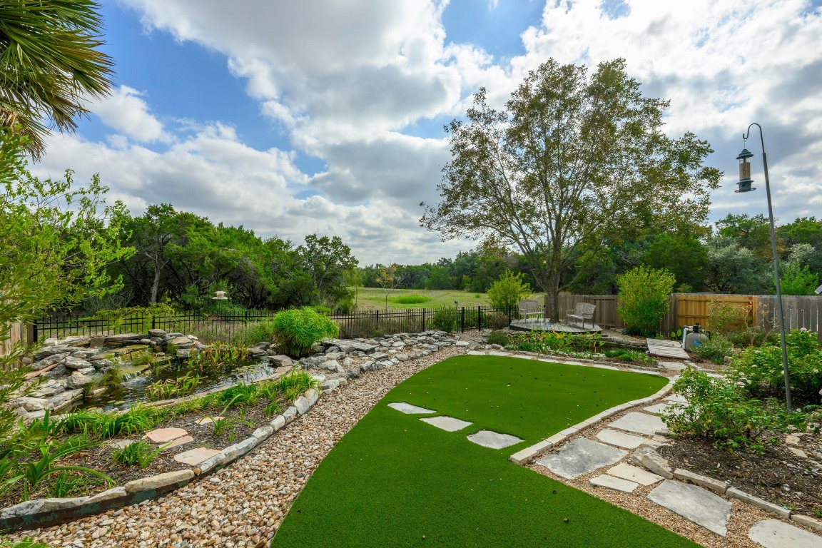 4705 Foster Ranch Road Austin, TX 78735 - Photo 25 of 40 a view of a patio with a yard