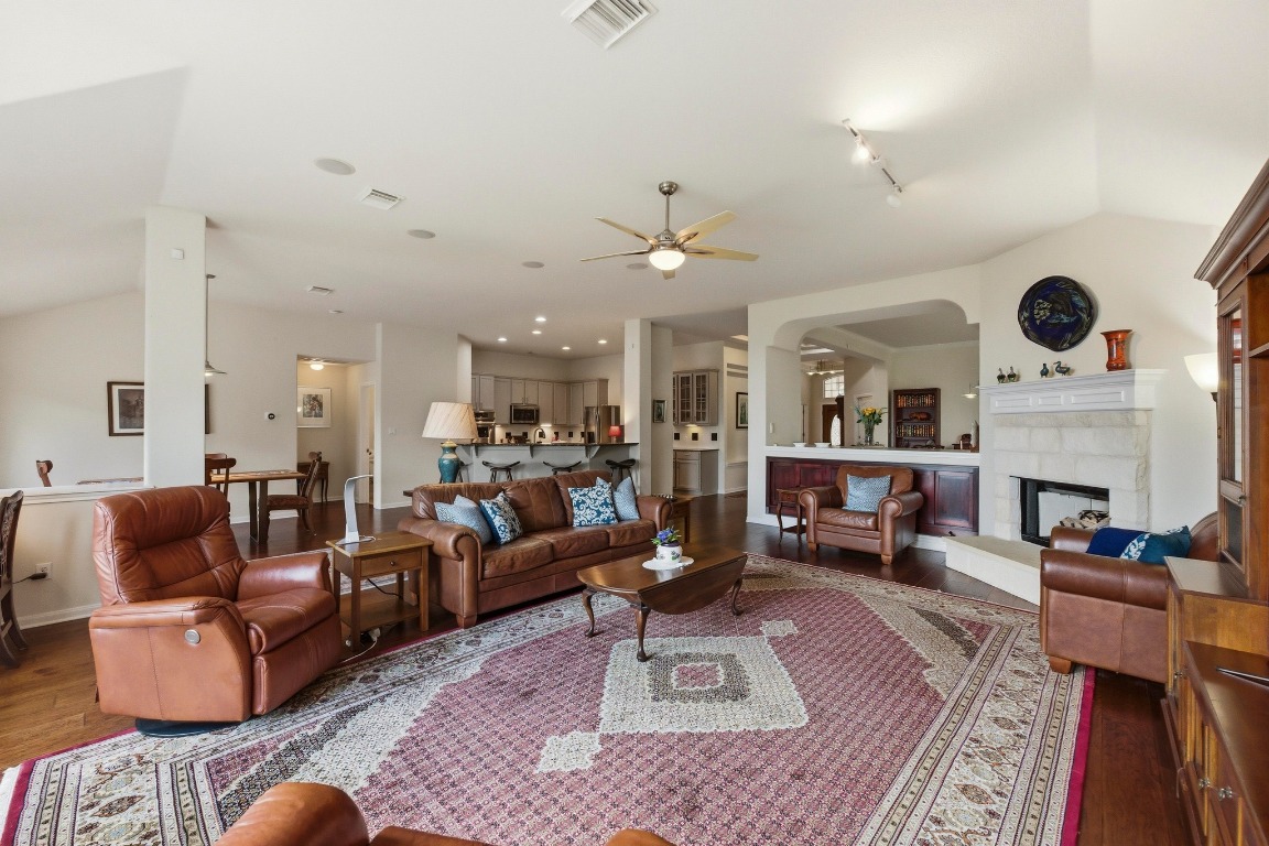4705 Foster Ranch Road Austin, TX 78735 - Photo 3 of 40 a living room with furniture and a fireplace