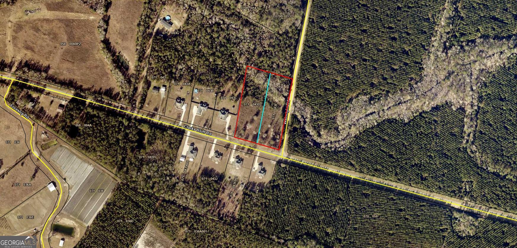 0 Clarks Bluff Road Kingsland, GA 31548 - Photo 1 of 1 a view of a large yard with wooden fence