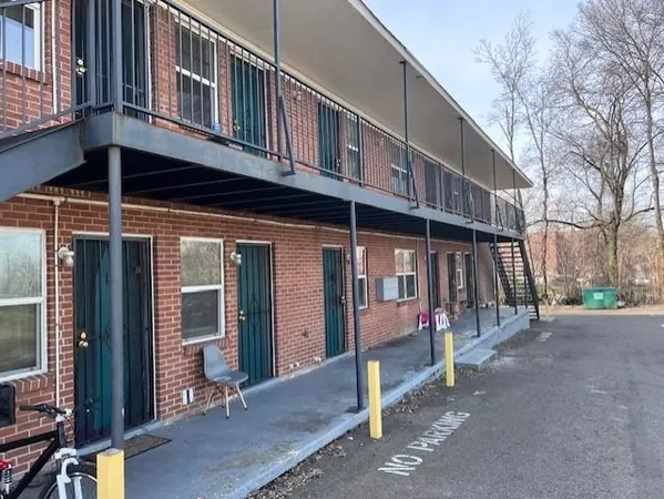 a front view of a building with street