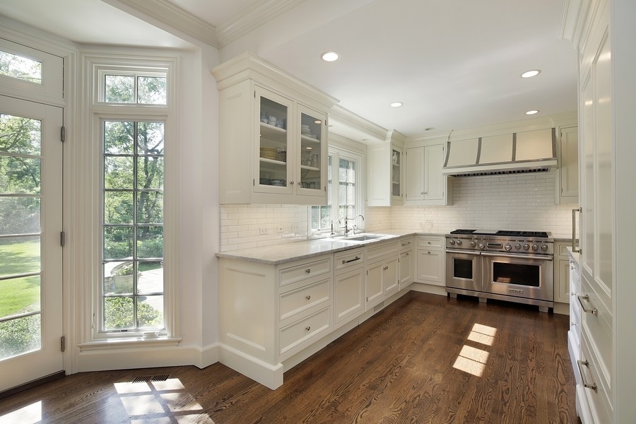 641 Briar Lane Northfield, IL 60093 - Photo 11 of 35 a kitchen with a stove a sink and a window