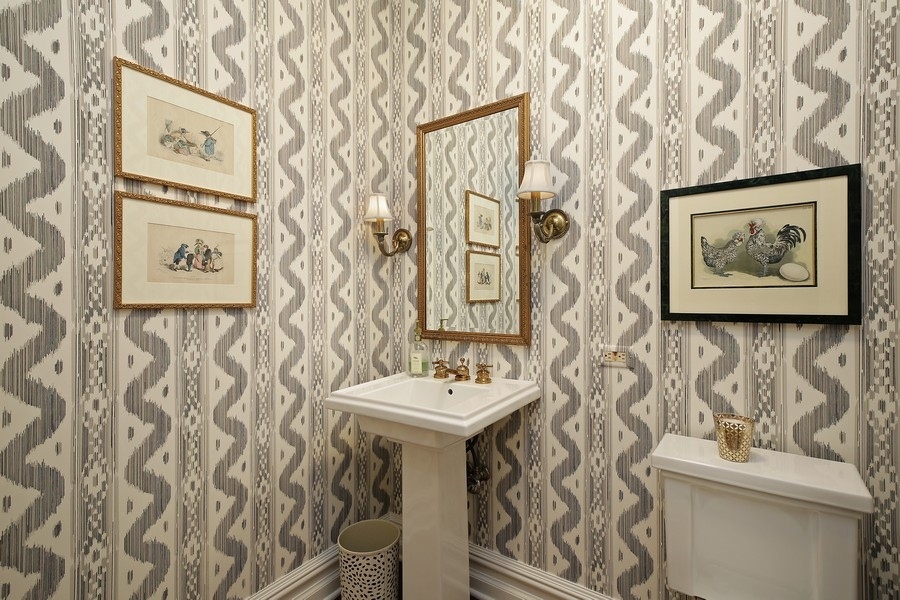 641 Briar Lane Northfield, IL 60093 - Photo 14 of 35 a bathroom with a sink and a mirror