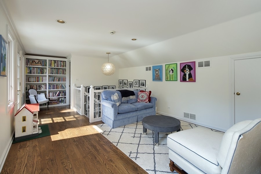 641 Briar Lane Northfield, IL 60093 - Photo 21 of 35 a living room with furniture and a wooden floor