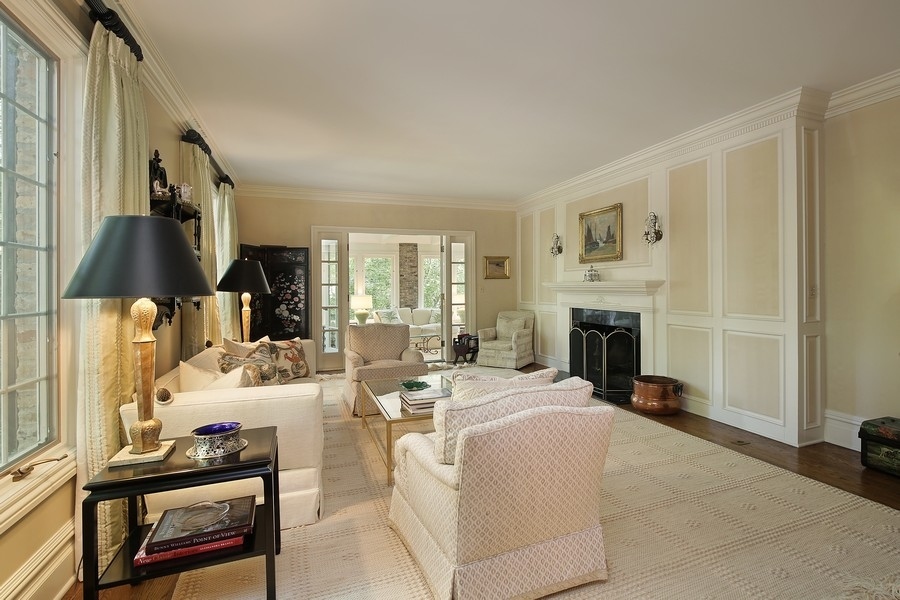 641 Briar Lane Northfield, IL 60093 - Photo 6 of 35 a living room with furniture and a fireplace