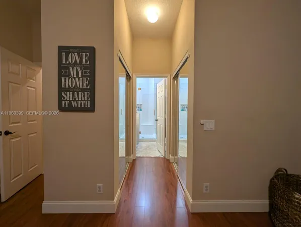 a bathroom with a sink a toilet and a shower