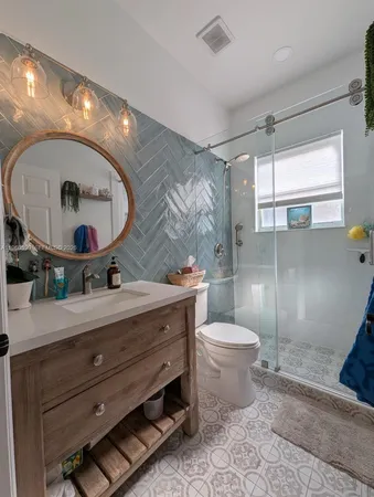 a bedroom with a bed and a book shelf