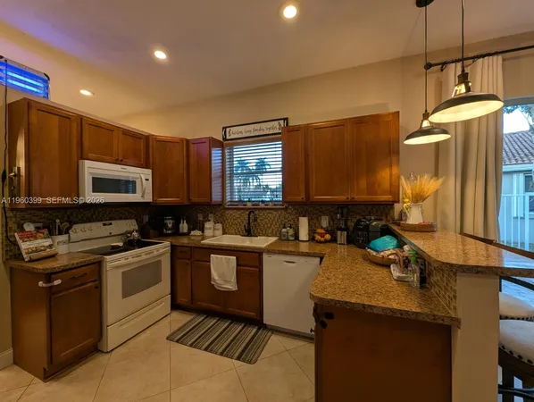 a bedroom with two beds and a table