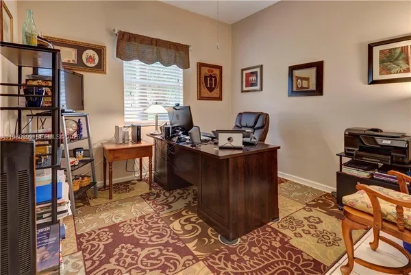 a view of a storage & utility room with wooden floor