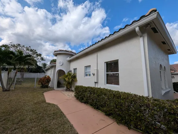 a house view with a garden space
