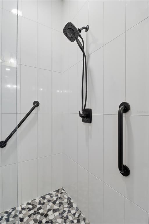 9689 East White Egret Path Inverness, FL 34450 - Photo 31 of 44 a bathroom with a shower