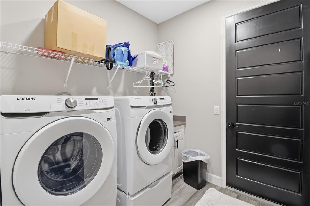 9689 East White Egret Path Inverness, FL 34450 - Photo 32 of 44 a utility room with dryer and washer