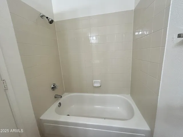 a close view of a bathtub in bathroom