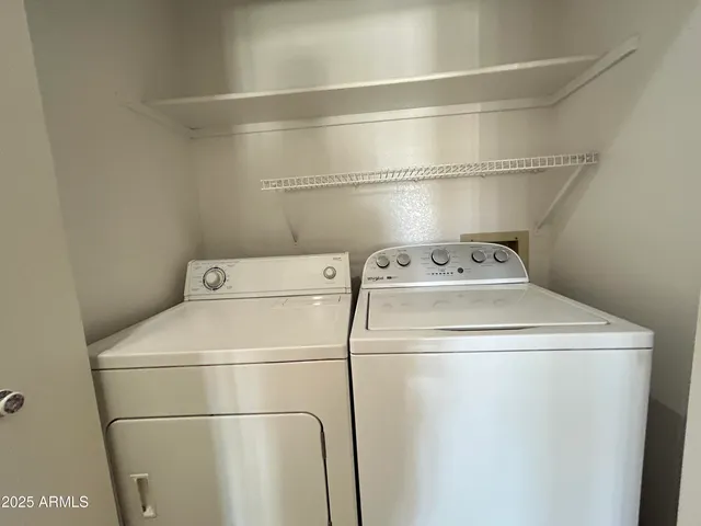 a close up view of washer and dryer with washer