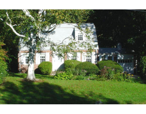 143 Follen Road Lexington, MA 02421 - Photo 1 of 3 a view of a garden with a building in the background