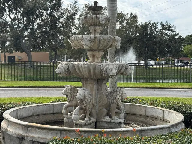 a view of swimming pool with a yard