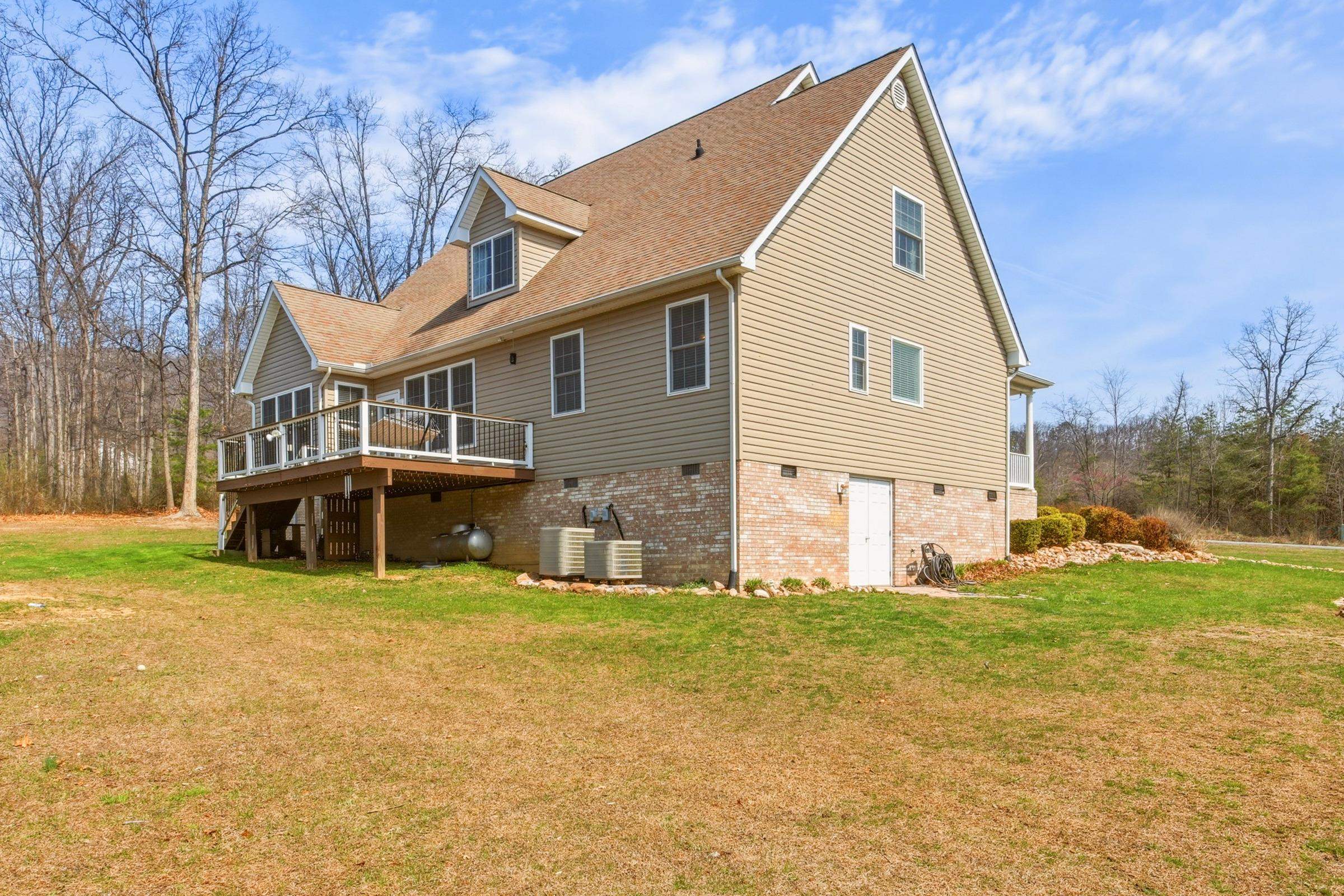 257 Hunter Road Maurertown, VA 22644 - Photo 38 of 61 a view of a house with a yard and sitting area