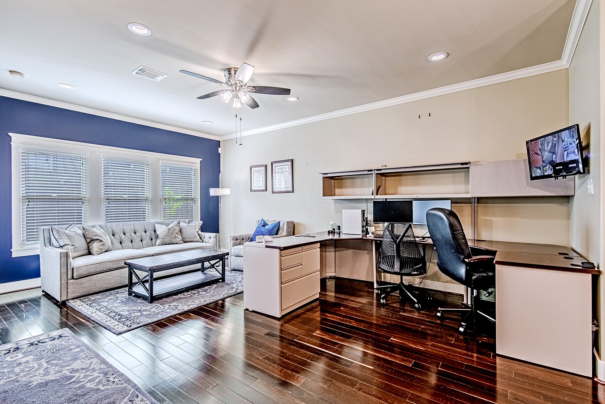 1425 Prince Street Houston, TX 77008 - Photo 7 of 22 Open-concept living space with large windows, wood flooring, and seamless flow to the home office.