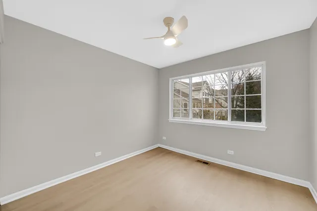 a work room with furniture and windows
