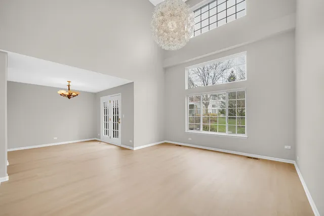 an empty room with windows