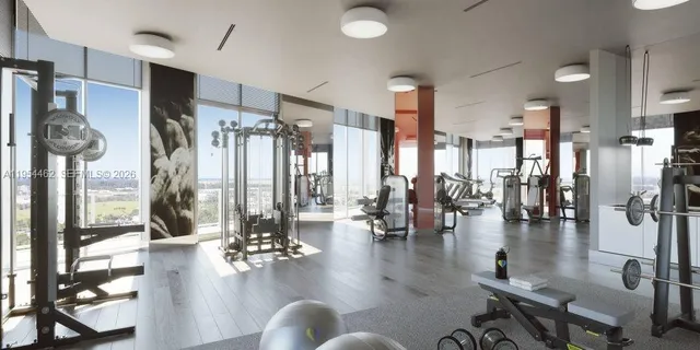 a lobby with furniture and floor to ceiling window