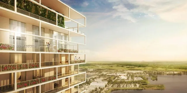 a view of a building with an ocean