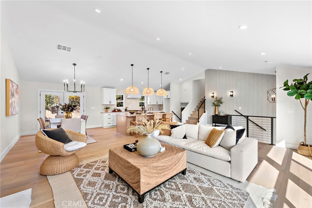 1850 Oriole Drive Costa Mesa, CA 92626 - Photo 1 of 33 a living room with furniture and a chandelier