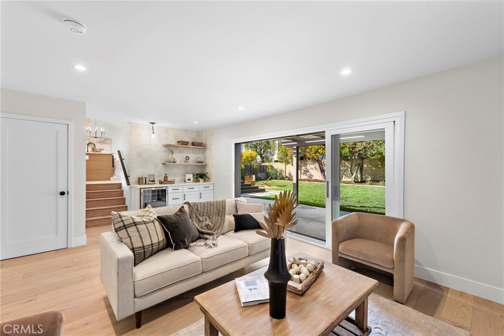 1850 Oriole Drive Costa Mesa, CA 92626 - Photo 15 of 33 a living room with furniture and a large window