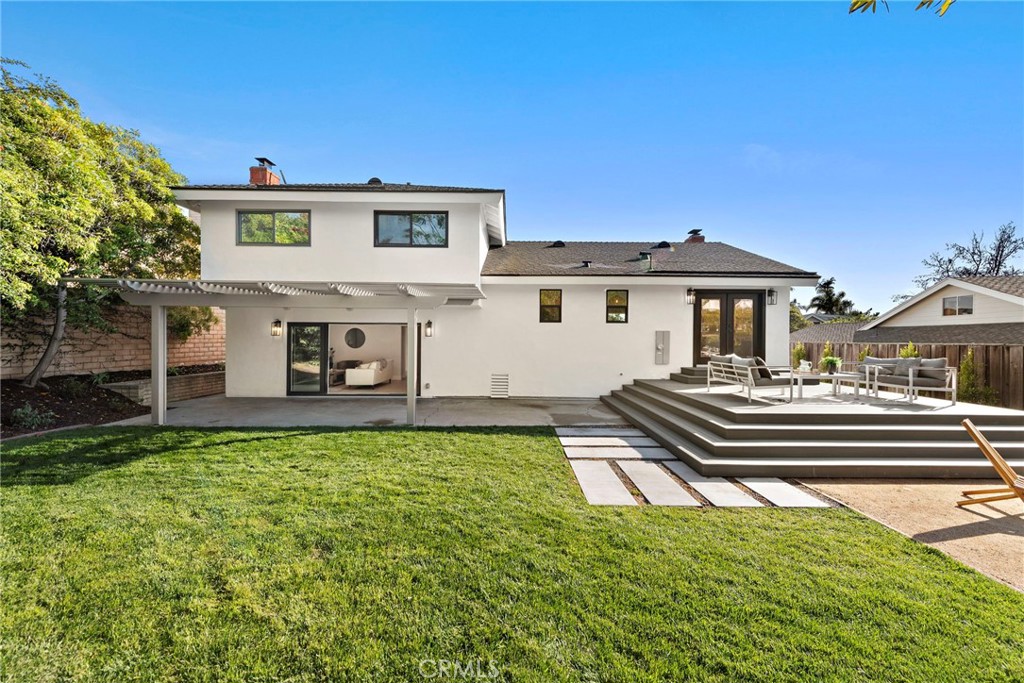 1850 Oriole Drive Costa Mesa, CA 92626 - Photo 19 of 33 a front view of a house with a garden