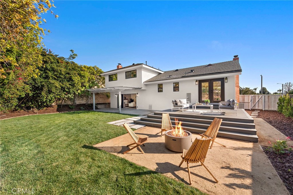1850 Oriole Drive Costa Mesa, CA 92626 - Photo 20 of 33 a view of a house with backyard porch and sitting area