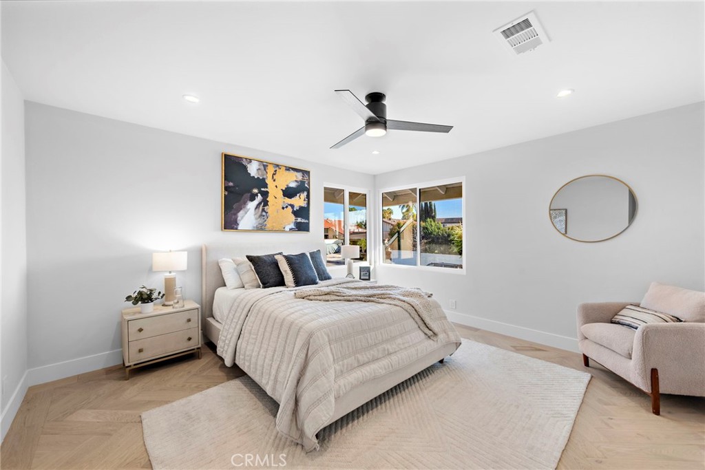 1850 Oriole Drive Costa Mesa, CA 92626 - Photo 23 of 33 a bedroom with a bed couch and window
