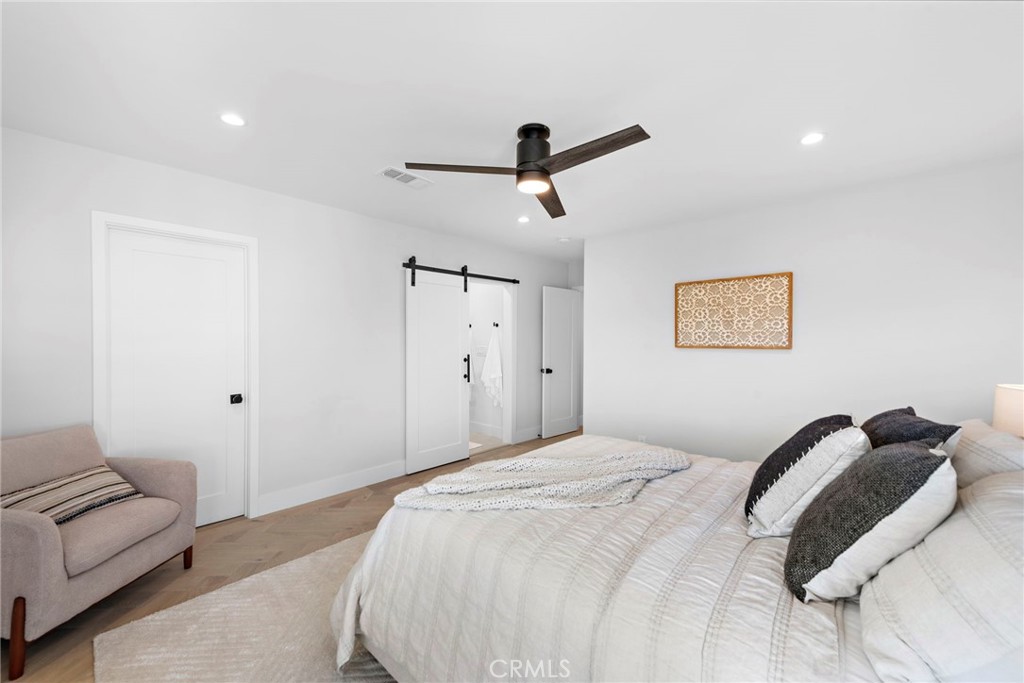 1850 Oriole Drive Costa Mesa, CA 92626 - Photo 24 of 33 a bedroom with a bed and a couch