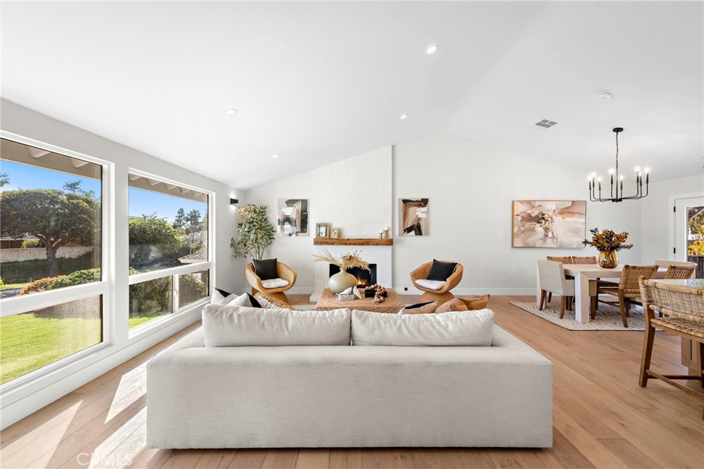 1850 Oriole Drive Costa Mesa, CA 92626 - Photo 6 of 33 a living room with furniture and a large window