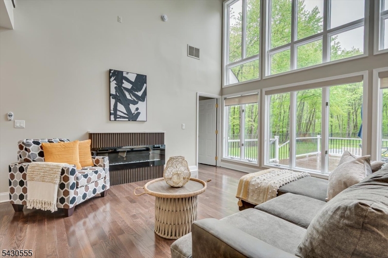 270 Mountain Road Bernards, NJ 07920 - Photo 16 of 41 a living room with furniture and a large window