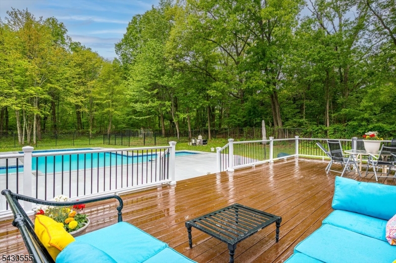270 Mountain Road Bernards, NJ 07920 - Photo 36 of 41 a view of a swimming pool with a patio and a yard