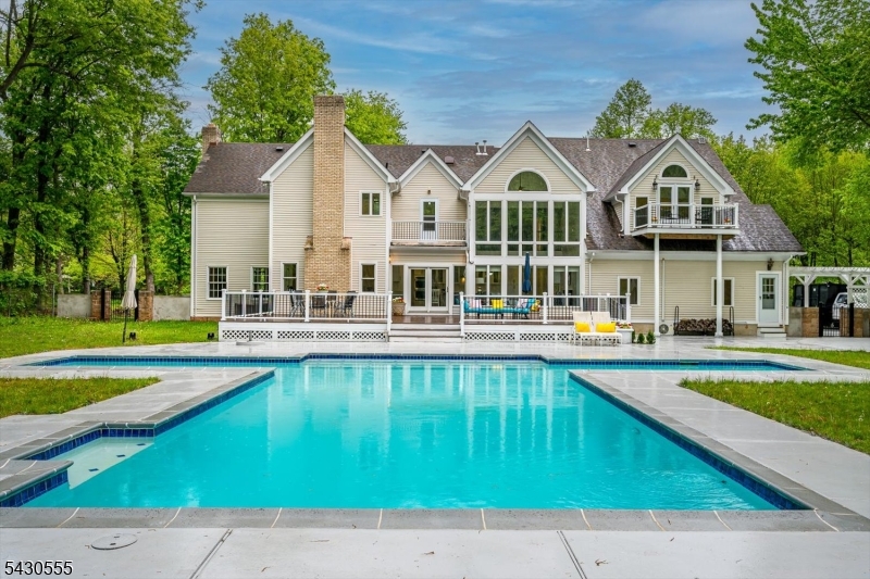 270 Mountain Road Bernards, NJ 07920 - Photo 40 of 41 a view of house with outdoor space and swimming pool
