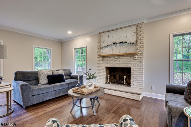 270 Mountain Road Bernards, NJ 07920 - Photo 5 of 41 a living room with furniture and a fireplace